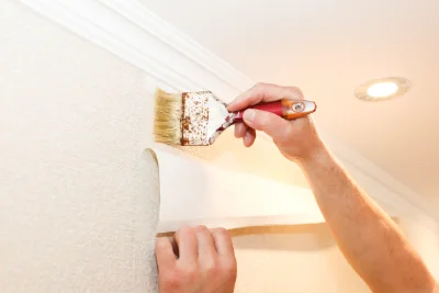 Pose de papier peint à Igé — revêtements muraux et toiles de verre